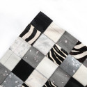 Zwart-wit koeienhuid patchwork vloerkleed