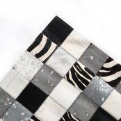 Maison Thuret - Zwart-wit koeienhuid patchwork vloerkleed