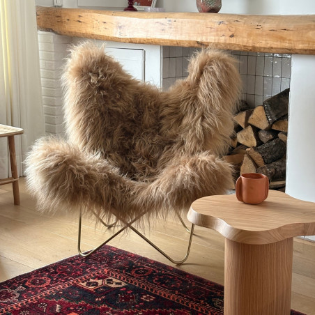 Fauteuil Butterfly AA original en peau de mouton Maison Thuret