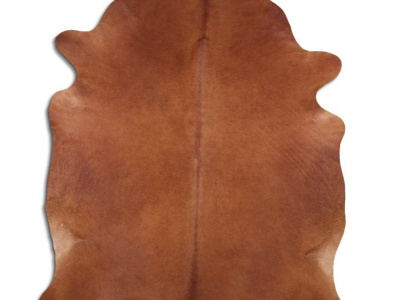 3 idées pour intégrer un tapis en peau de vache marron dans votre déco